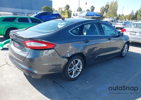 2015 Ford Fusion Energi Se Luxury z USA, uszkodzony, nr VIN 3FA6P0PU2FR305111